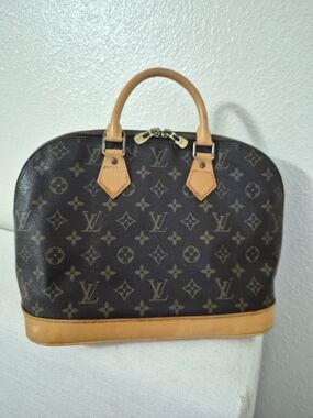 Louis Vuitton Brown Monogram Alma Handbag